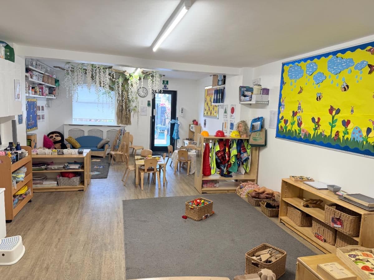 Unique child montessori bright classroom with educational displays