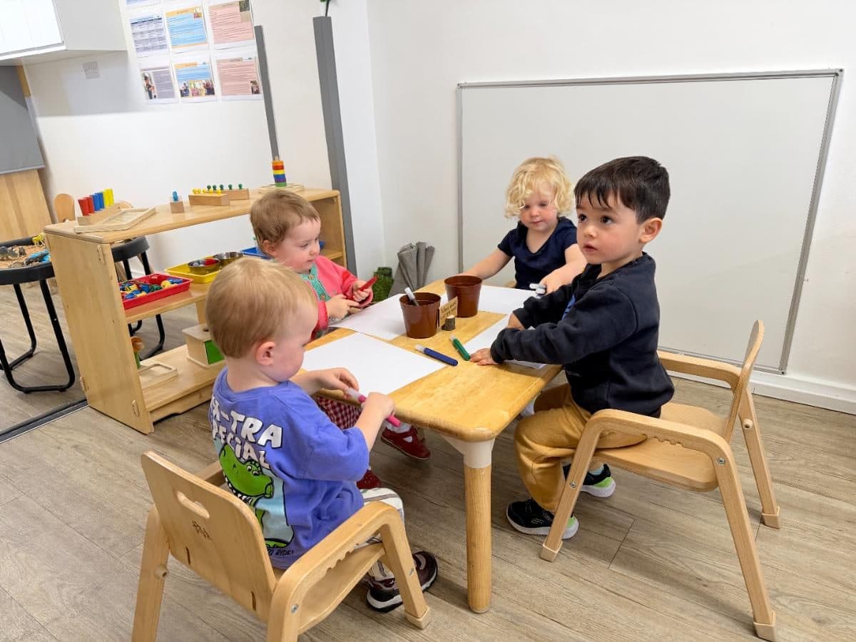 Unique child montessori children engaged in creative activities