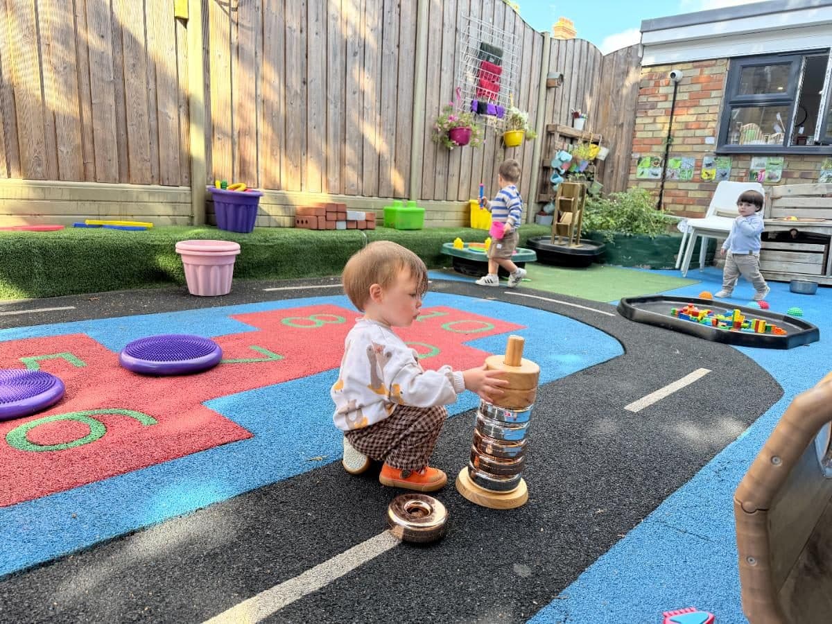 Unique child montessori children playing outdoors colorfully