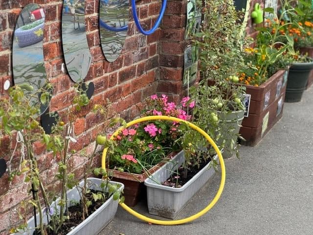 Northolt nursery garden with flowering plants at unique child montessori