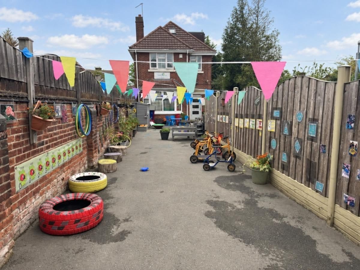 Outdoor play area at unique child montessori northolt