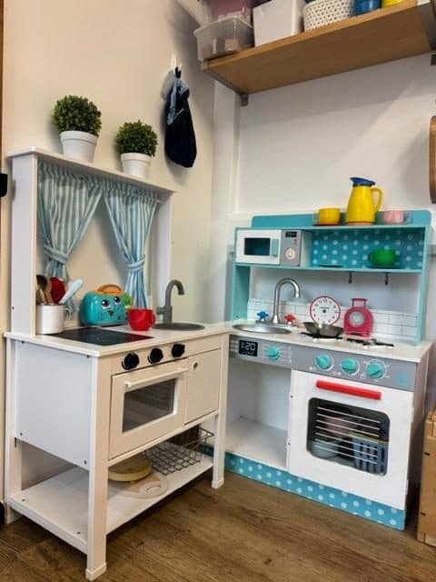 Play kitchen area at unique child montessori northolt